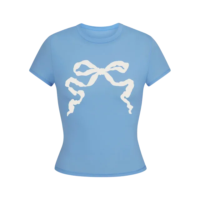 Maglietta cropped azzurra con fiocco in cotone