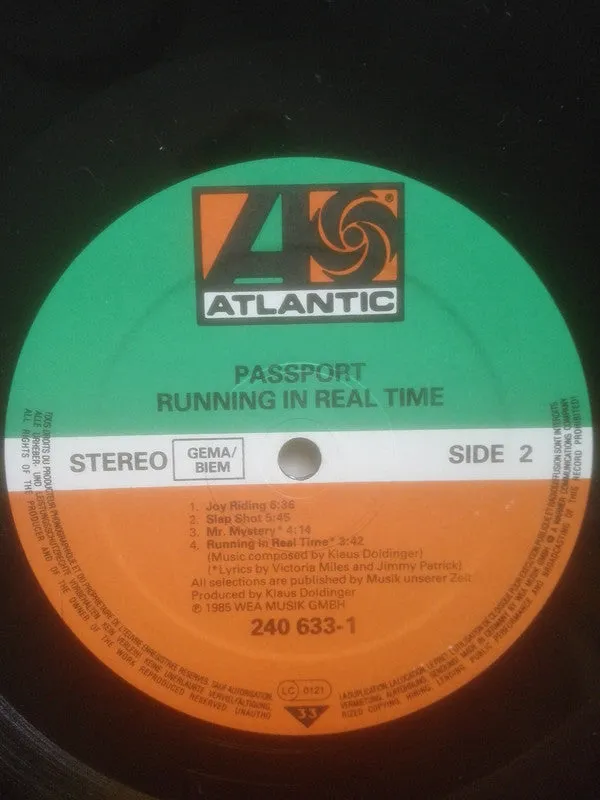 Passport Running In Real Time vinile LP tedesco fusion NM