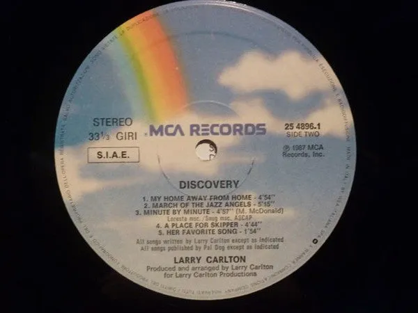 Larry Carlton Discovery LP vinile smooth jazz MCA 1987 usato